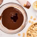 Melted chocolate mixture in a mixing bowl.