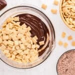 Rice Chex cereal and melted chocolate in a large mixing bow.