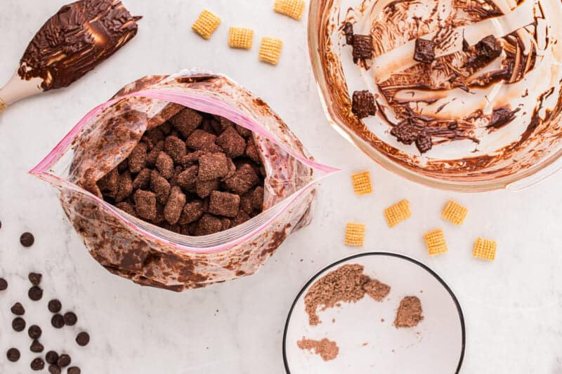 Chocolate-coated puppy chow in a resealable bag.