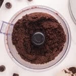 Chocolate cheesecake crust combined in a food processor.