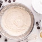 Cheesecake batter in a mixing bowl.