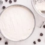 Cheesecake filling spread into a springform pan.