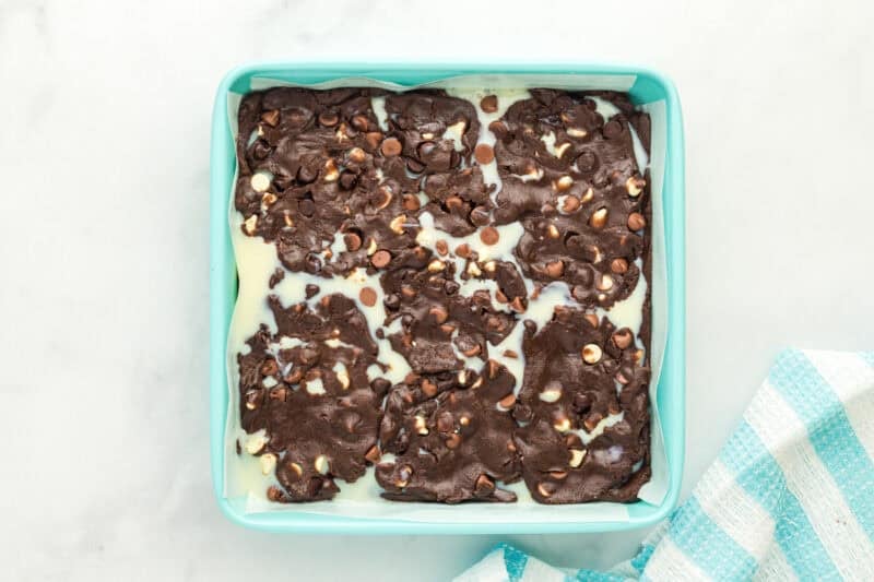 Cake mix brownie batter swirled with sweetened condensed milk.