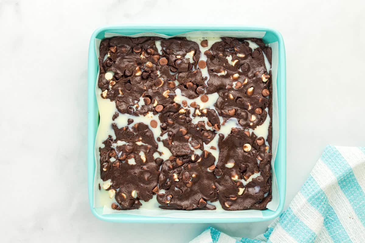 Cake mix brownie batter swirled with sweetened condensed milk.