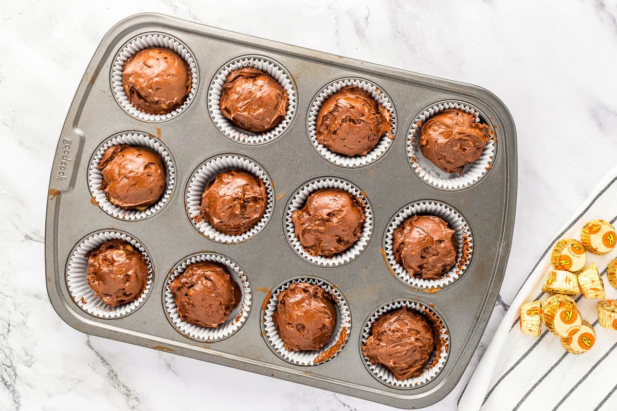 Chocolate batter in cupcake tin.