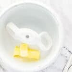 Butter in a mixer.