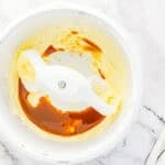 Adding caramel sauce to butter.