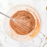 Whisking together dry ingredients.